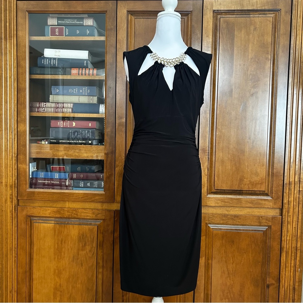 Chic Black Dress with Chain Detail. Size M
